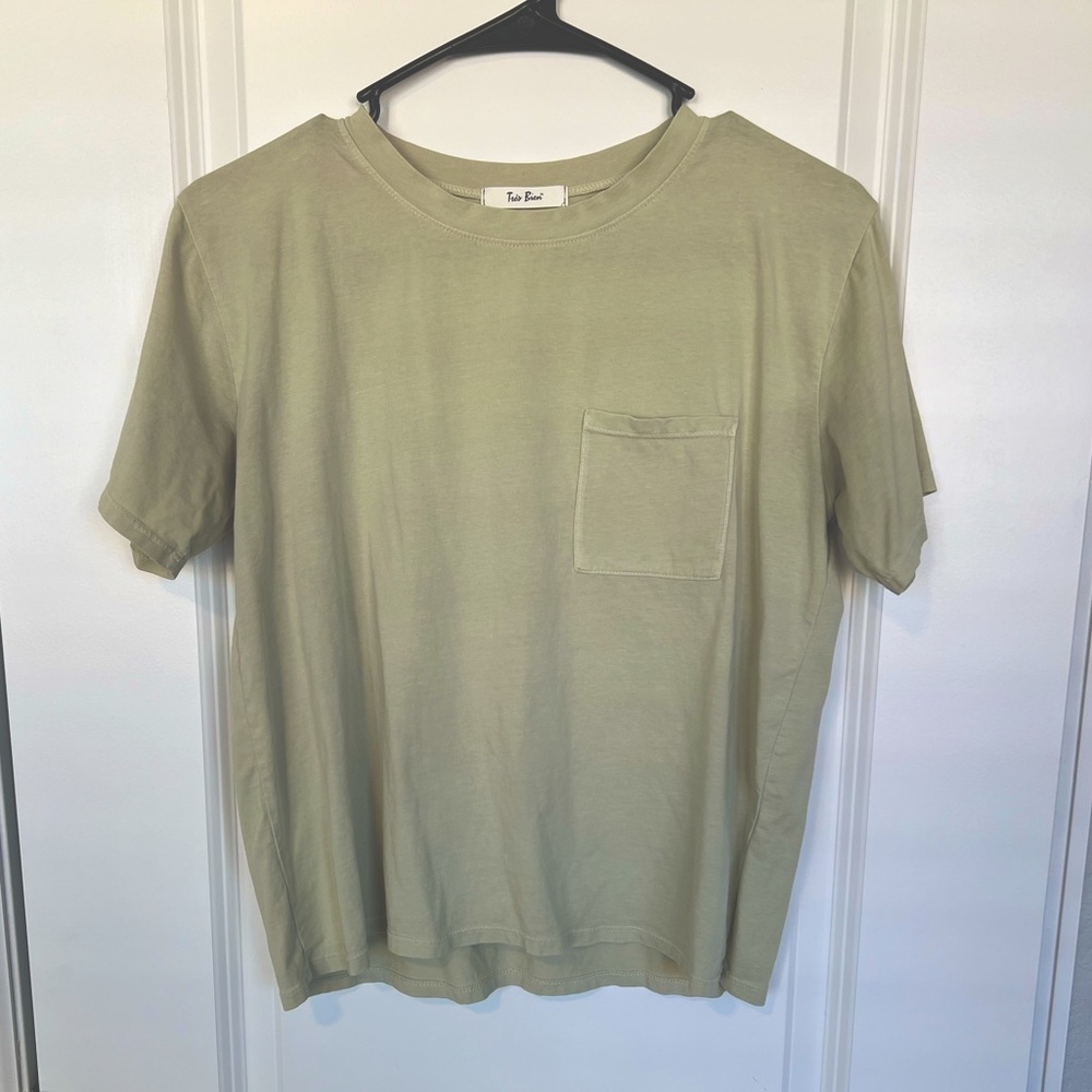 Shirt is lighter than appears in photo!